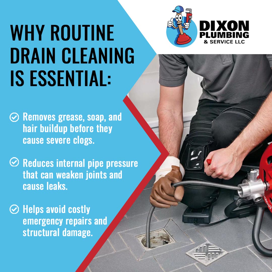Plumber using a drain auger to clear a floor drain during routine drain cleaning service
